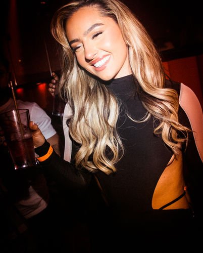 Blonde woman at nightclub